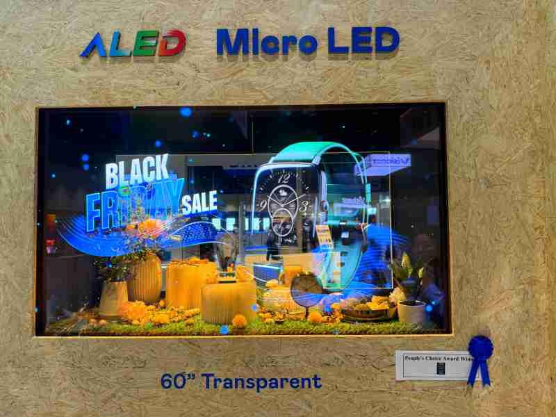 赏金国际60吋高透明度Micro LED显示器获”最佳Micro LED技术应用奖”，，，将Micro LED面板透明化之设计特性极致发挥，，以可扩展性无缝拼接技术打造，，，，具备600 nits全画面亮度、、、、大于60%穿透率及超过NTSC 110%的优异广色域表现，，可依需求灵活应用于各种场域